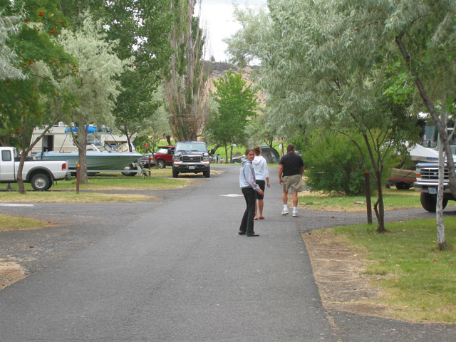 Kellie, Kailey (granddaughter's) and Wayne on road by our campsite