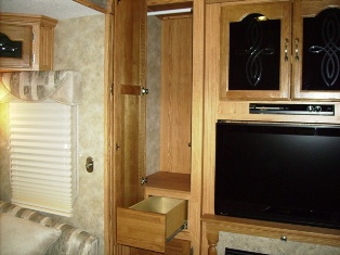 360SB Closet next to enertainment center
