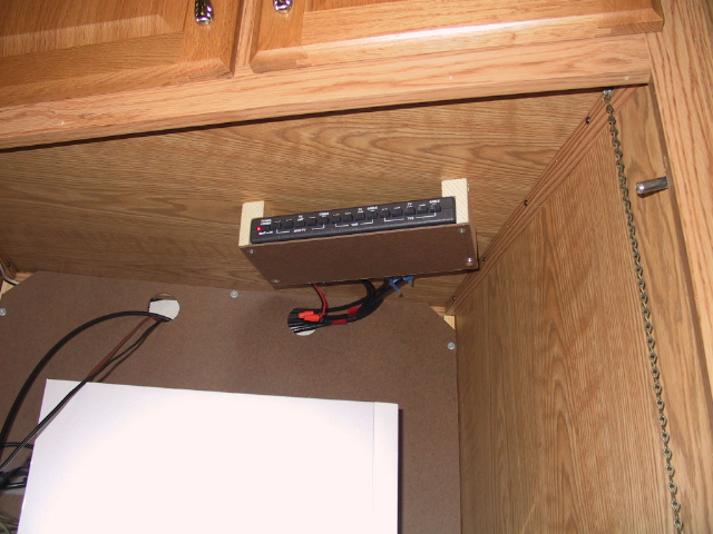 TV Selection Box mounted on top of TV cabinet. Out of the way!